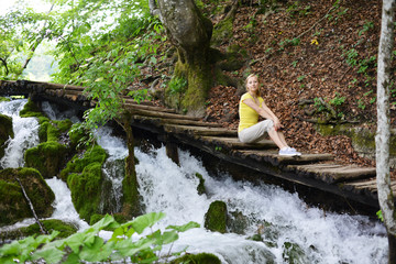 woman near  waterfalls