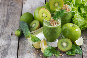 Fototapeta na wymiar healthy green smoothie with sprouts on a wooden background