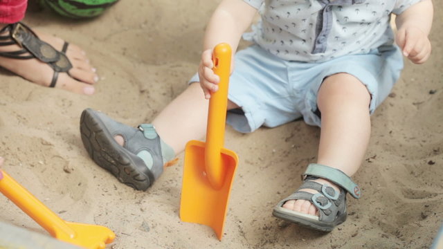 Mom with baby sandbox