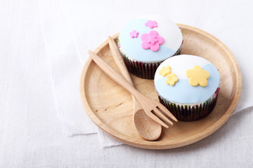 chocolate cupcakes with fondant decoration