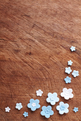 Abstract blue flower on wood background