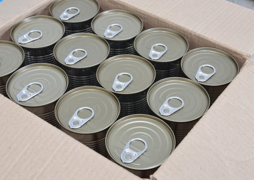 tin food can in paper box