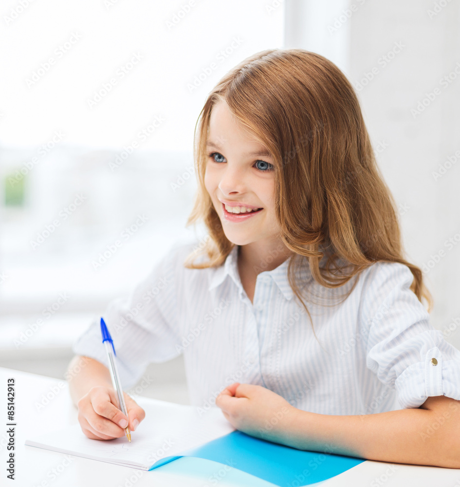 Sticker student girl writing in notebook at school