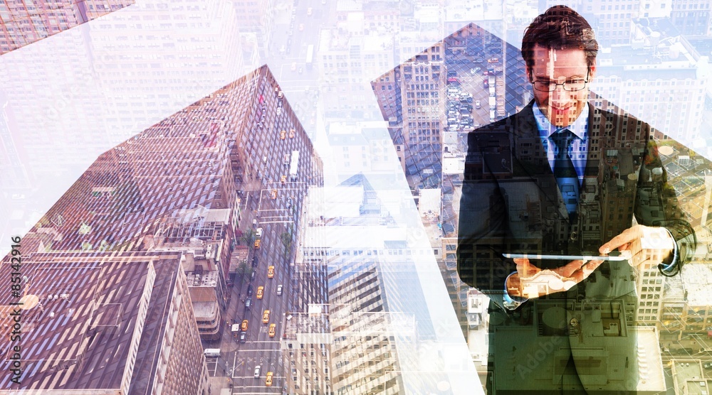 Aufkleber Composite image of businessman standing while using a tablet pc