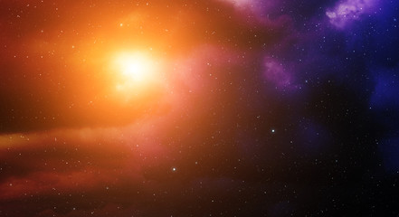 Space background with orange nebula and stars.