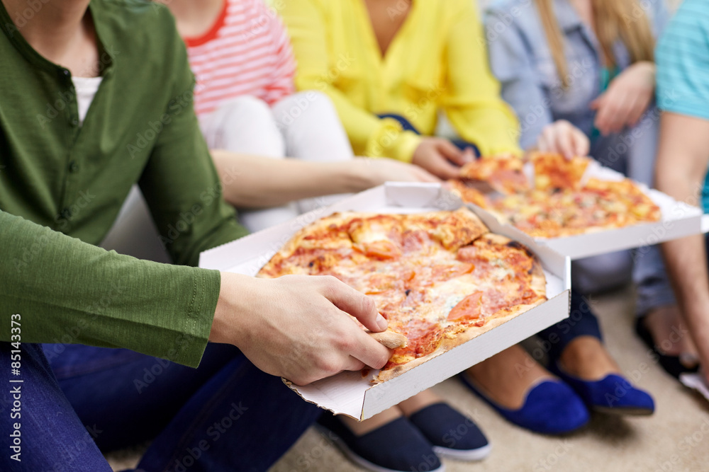 Sticker close up of happy friends eating pizza at home