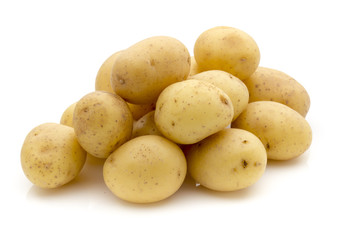 Potatoes on the white background.  New harvest.