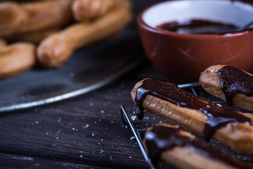 Fresh churro with chocolate dip