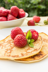 Pancakes/ Pancakes with fresh strawberries