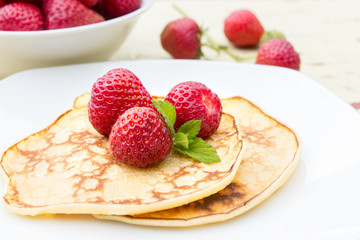 Pancakes/ Pancakes with fresh strawberries