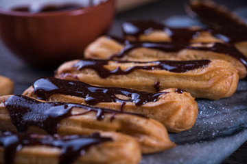 Decorating churros with hot chocolate dip