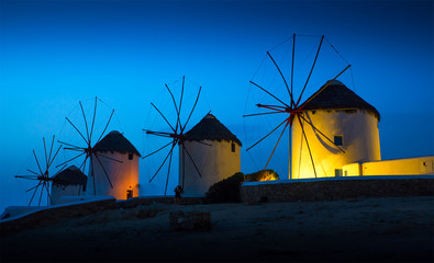 Mills on the Greek island in the sunset