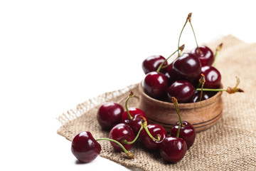 cherries in wooden bowl