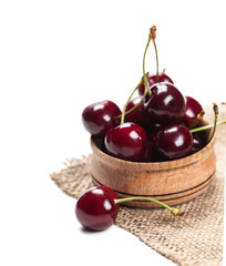 cherries in wooden bowl
