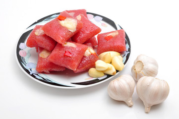 Vietnamese Fermented Pork Roll or Nem lai Vung on a white background