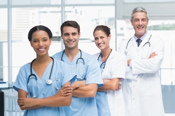 Portrait of confident doctors in row