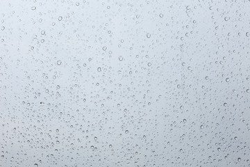 rain drop on the car glass in the rainy day 