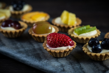 Mini pastry tartlets with fresh fruits