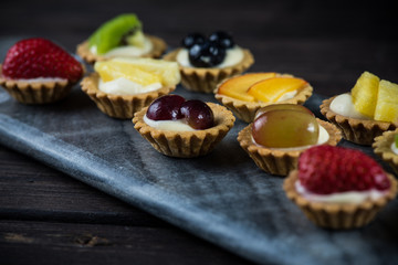 Mini pastry tartlets with fresh fruits