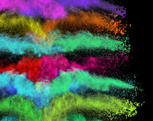 Launched colorful powder on black background