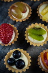 Mini pastry tartlets with fresh fruits