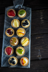 Mini pastry tartlets with fresh fruits