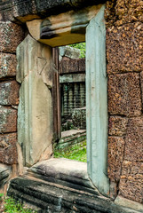 windows of a library in ruins in the archaeological place of the oriental mebon in siam reap, cambodia