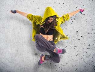 Teenager girl dancing hip hop