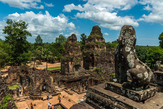 general sight and statue of vigilant lion of the archaeological place of pre rup in siam reap, cambodia