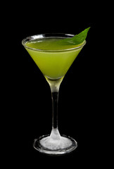 alcohol cocktail in glass on black background