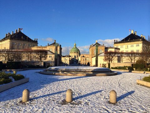 Amalienborg Palace in the winter snow, Frederiksstaden, Copenhagen, Oresund Region, Zealand, Denmark