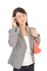 頭痛をうったえる女性