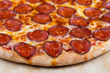 round hot pizza close up top view