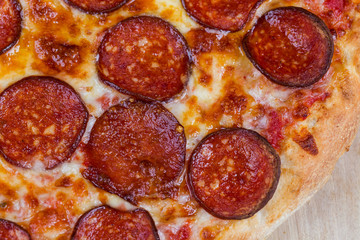 round hot pizza close up top view