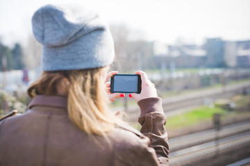 young beautiful blonde hipster woman