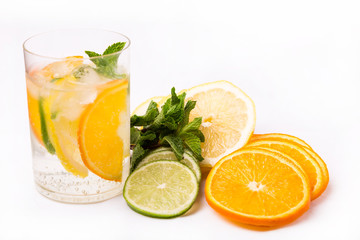 fresh cold cocktail in glass with sliced citus