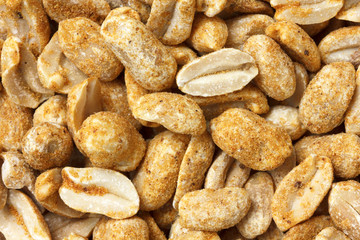 Spicy dry roasted peanuts abstract detail from above.