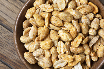 Rustic spicy dry roasted peanuts detail from above.