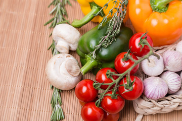 group fresh colored vegetables on wooden