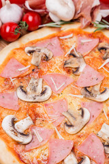 Fototapeta na wymiar hot pizza with garnish and components