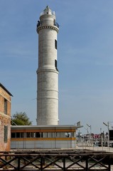 Fototapeta na wymiar White lighthouse in Murano island, Italy