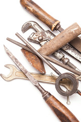 old metal work hand tools with rust on white
