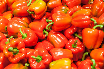 many fresh red sweet pepper