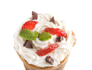 Rolled of cone pancakes with sweet cream and fruits