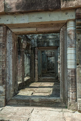 sight of the ruins of a library in the archaeological place ta keo in siam reap, cambodia