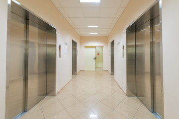 entrance of a residential building with an elevator