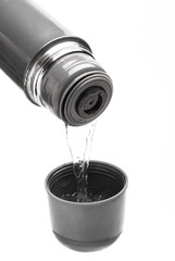 from thermos pour hot water in cup
