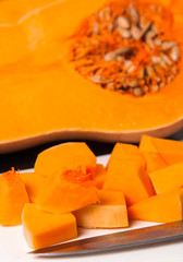 half fresh orange pumpkin with slice pieces