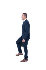Businessman climbing 