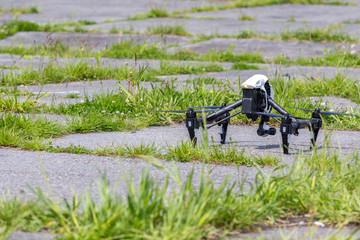 Obraz na płótnie Canvas Small drone on the ground